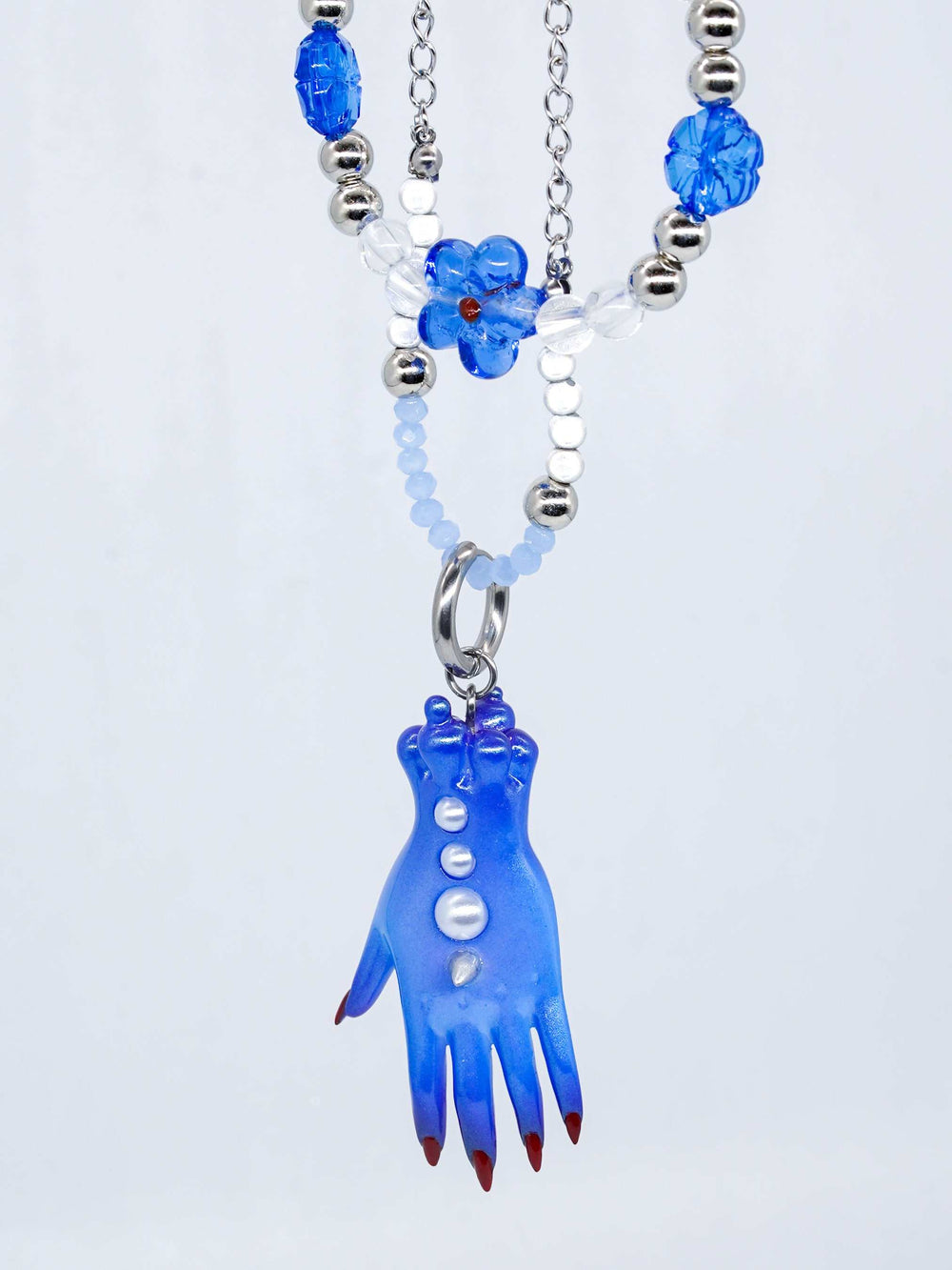 Blue Fairy Goblin Hands Jewelry Set, Whimsical Goblin Hands Earring and Necklace, Magical Blue Fairy Accessories, Fantasy Hands Pendant and Hairclips, Cute Goblin Hands Earring Ensemble, Quirky Blue Fairy Necklace Set, Fairy Tale Inspired Jewelry Collection, Unique Goblin Hands Hairclips, Enchanting Blue Fantasy Jewelry, Hand-shaped Pendant and Hairclip Set,