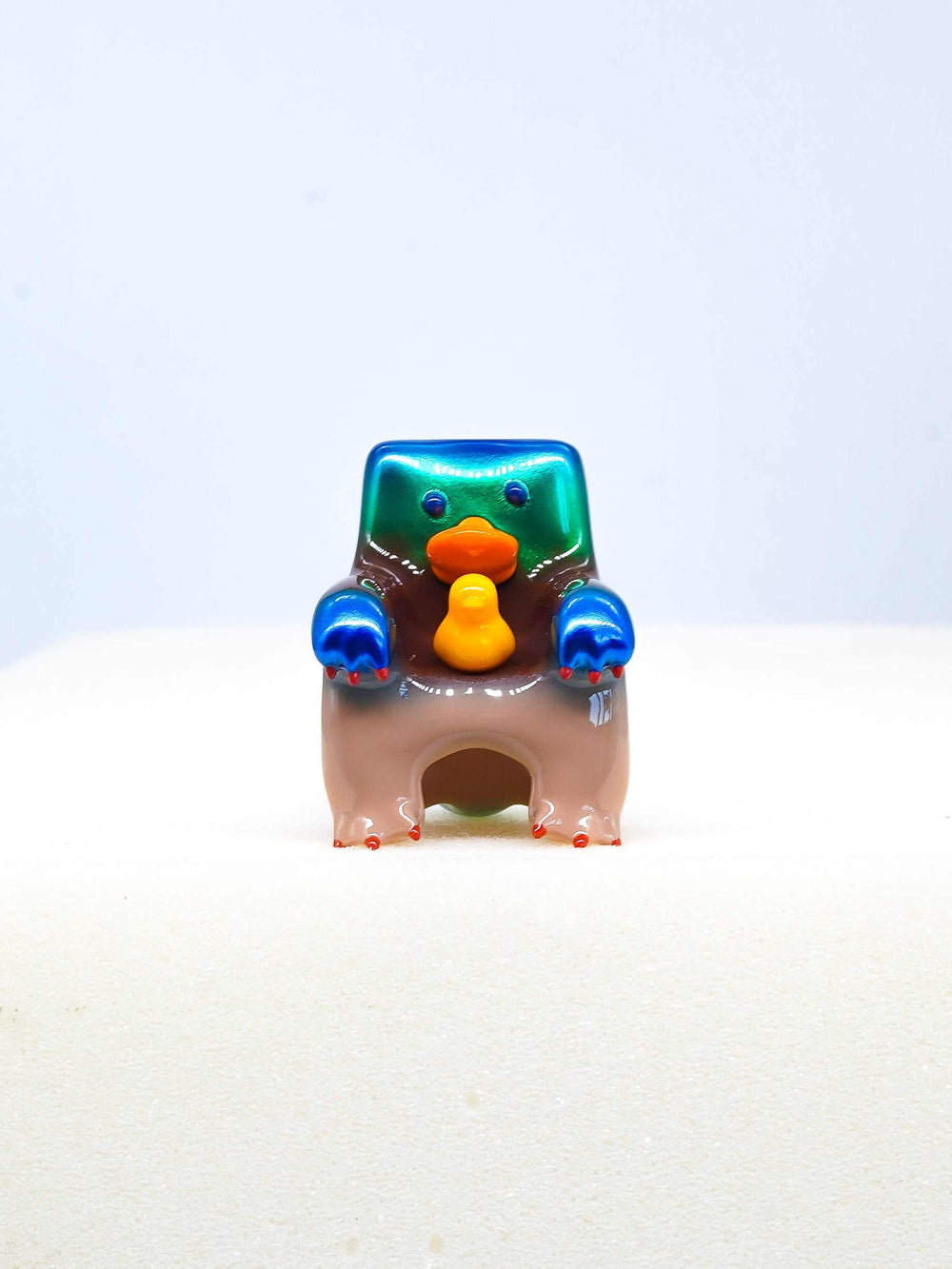 Cute mallard duck and platypus figure toy with vibrant colors and intricate details