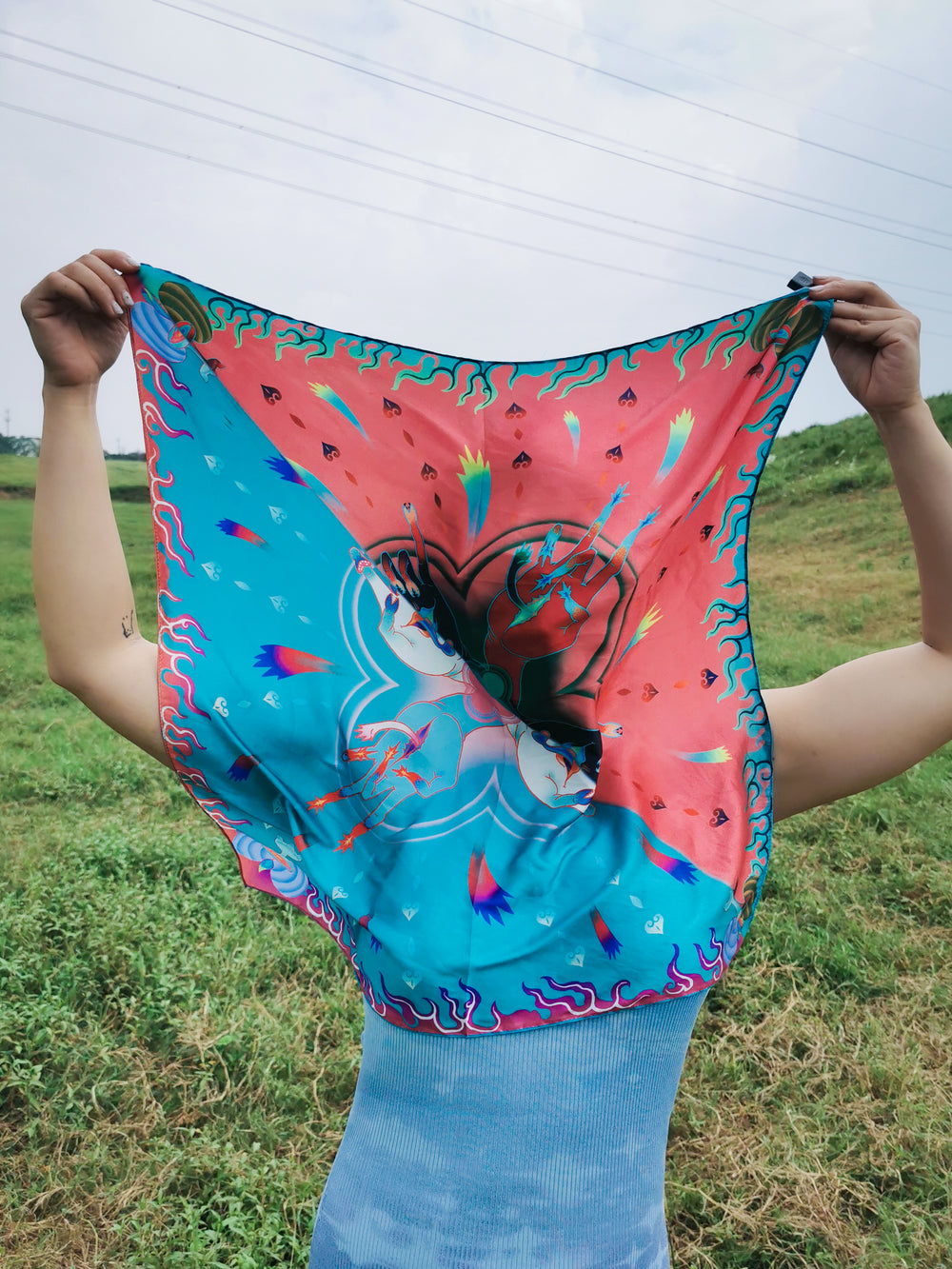 A unique hand-illustrated scarf that does the work of two