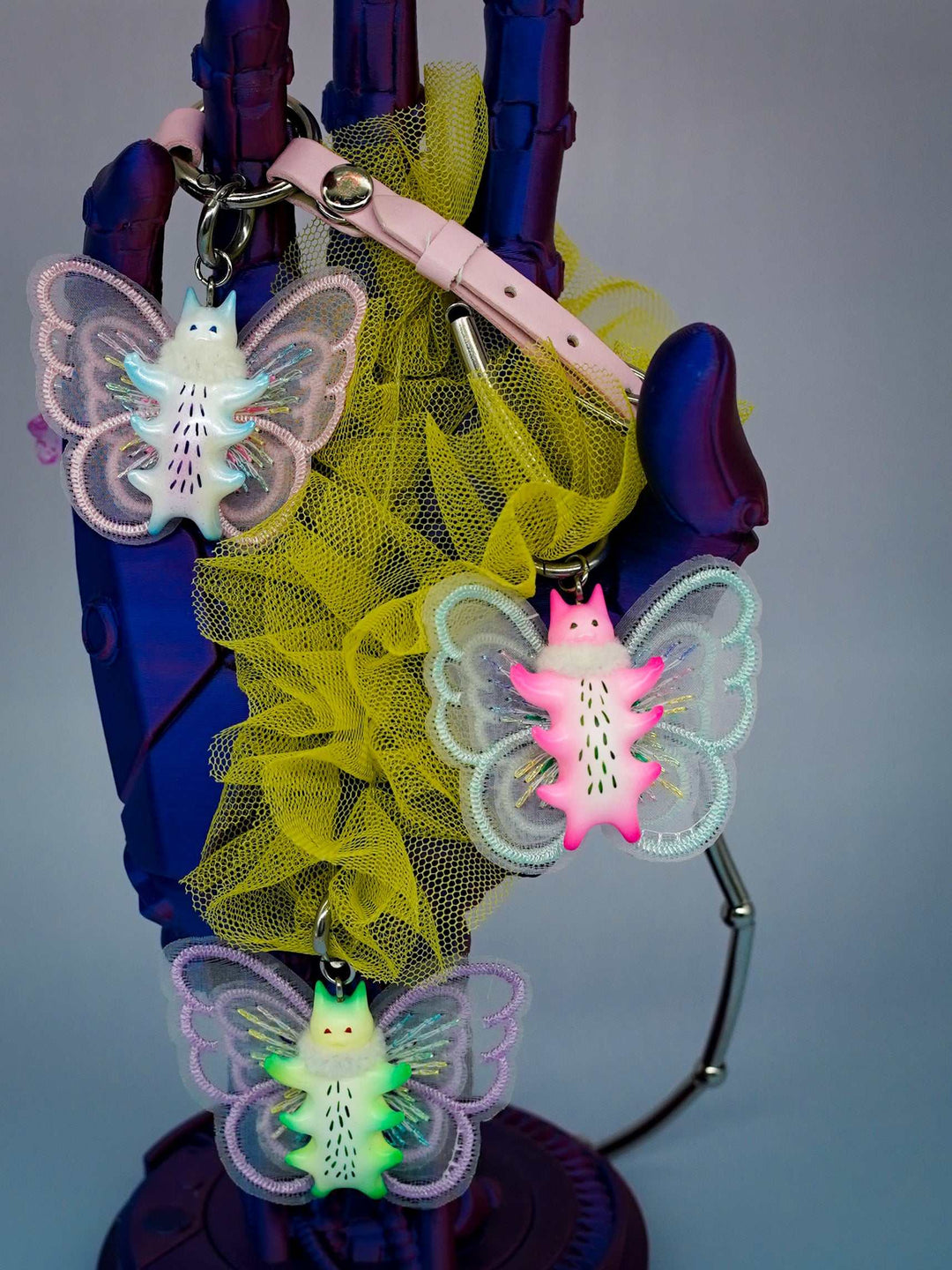 Butterfly cat with fur snood necklace and earring in flamingo pink design with mint green wings.