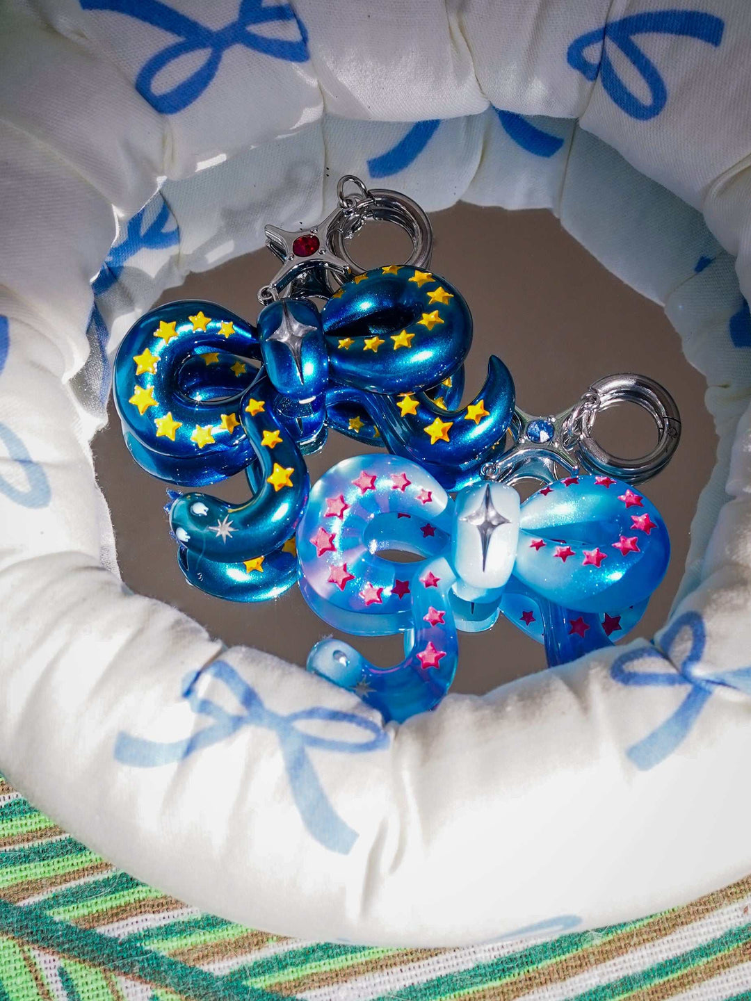 Ice blue snake bowtie necklace and earring with pink stars and felt tongue accessory