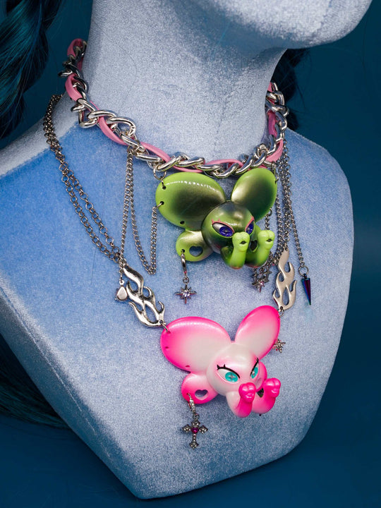 Twin-Trunk Diva Elephant Necklace in pink pearl white with two trunks and blue-green starry eyes
