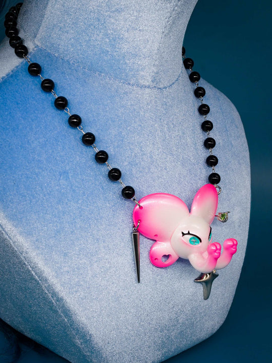 Twin-Trunk Diva Elephant Necklace in pink pearl white with two trunks and sparkling blue-green eyes