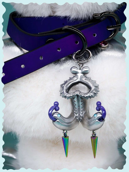 Twin-Headed Pitcher Serpent silver earrings with violet tendrils and blue eyes inspired by pitcher plant