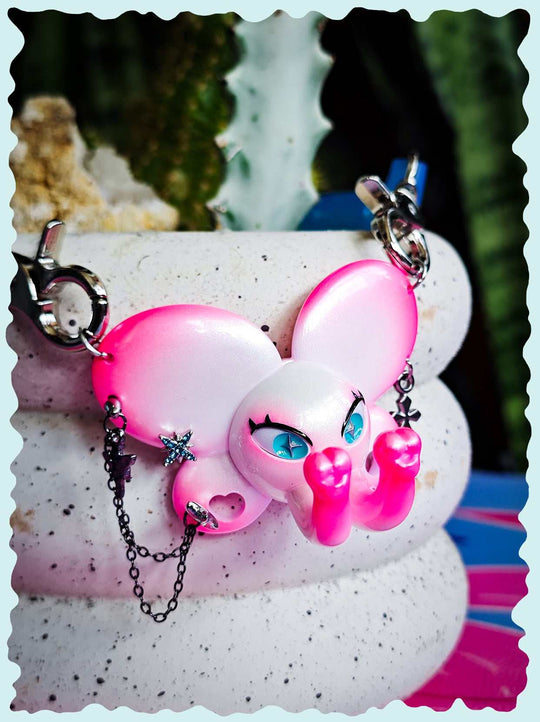 Twin-Trunk Diva Elephant Necklace pink pearl white with two trunks and blue-green star pupils
