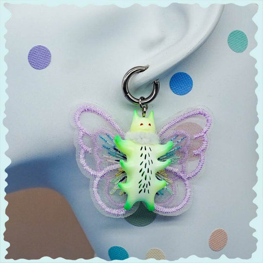 Butterfly cat earring with fur snood and embroidery wings in green and lavender.