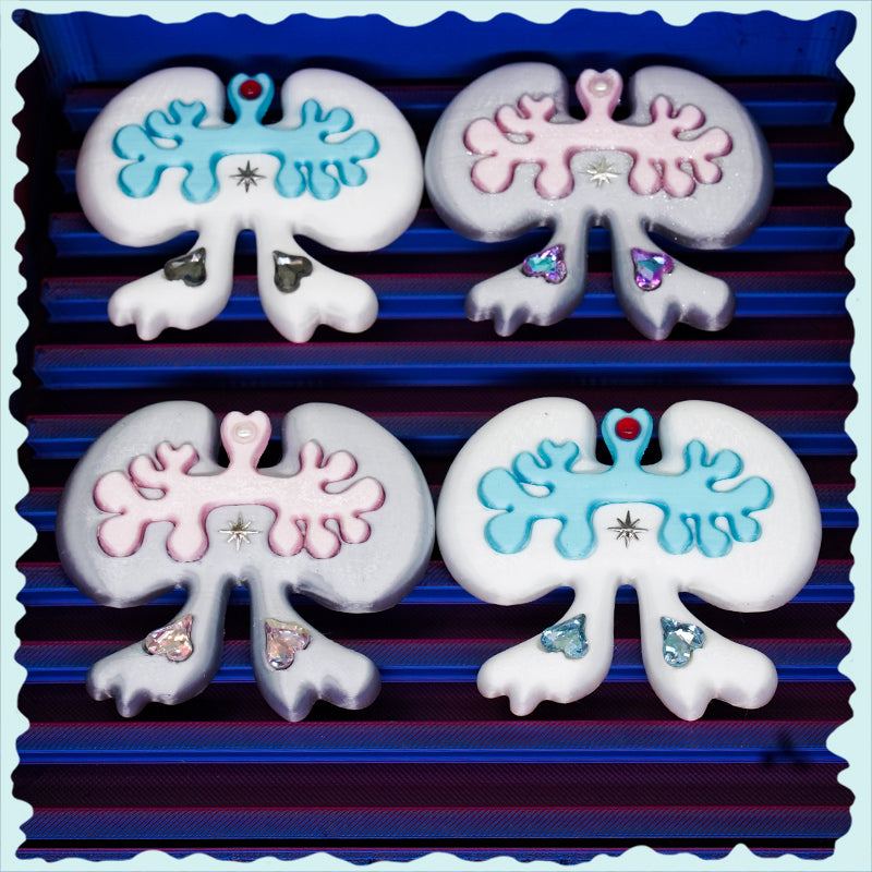 Weird cute lung-shaped bow hair clip in white and green with 3D printed texture and rhinestone details