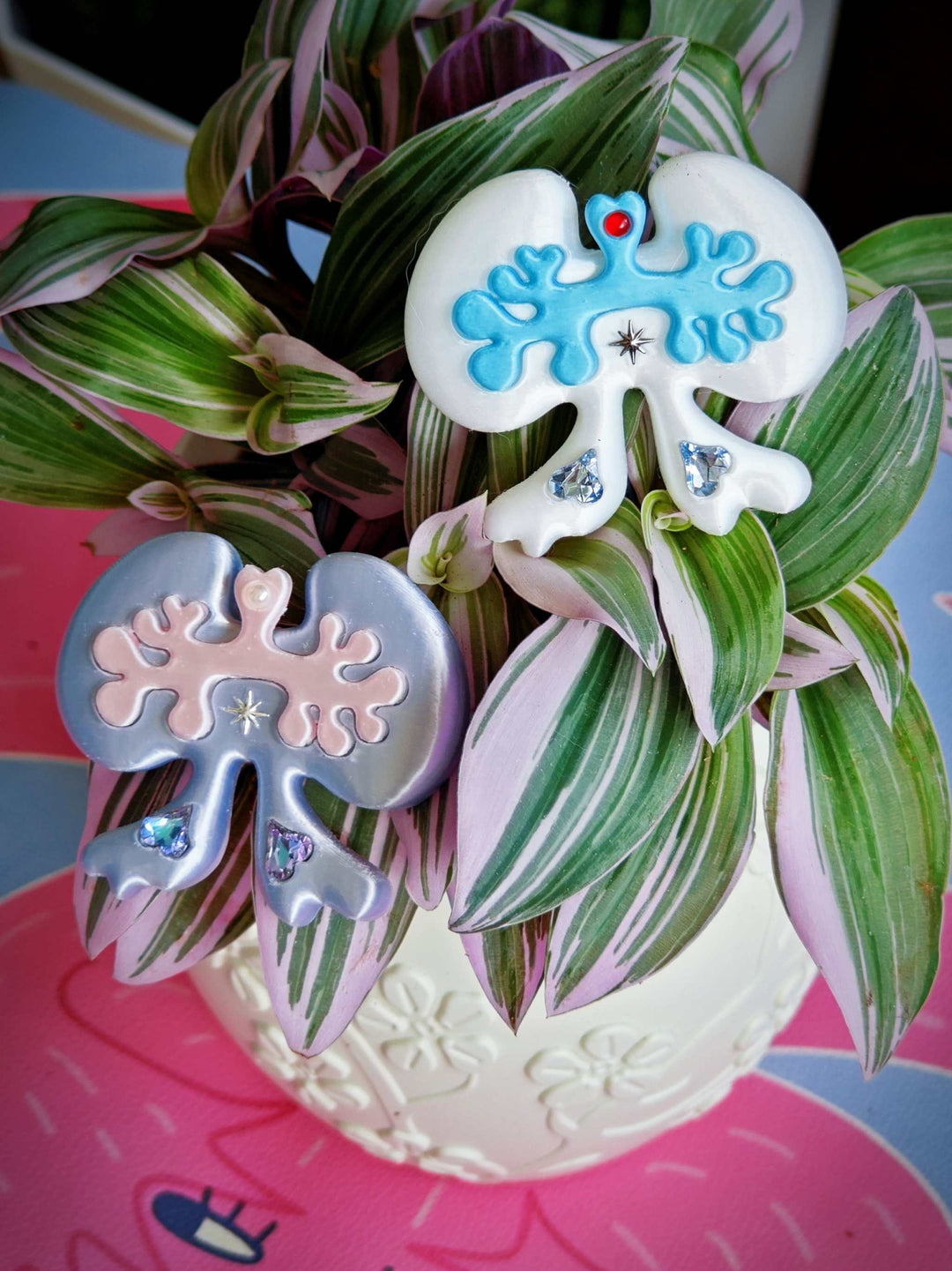 Weird cute lung-shaped bow hair clip 3D printed with rhinestones in white green and silver pink colors