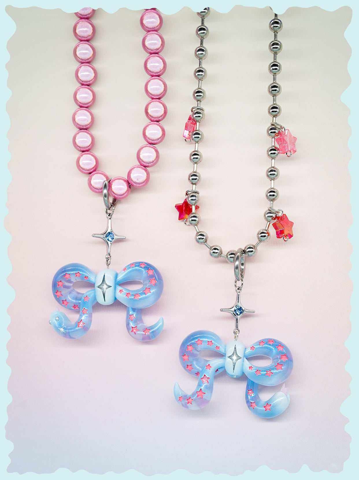 Ice blue snake bowtie necklace and earring set with pink star accents and playful felt tongue