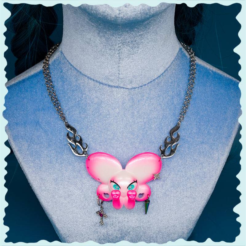 Twin-Trunk Diva Elephant Necklace with bubblegum pearl and laser bead details