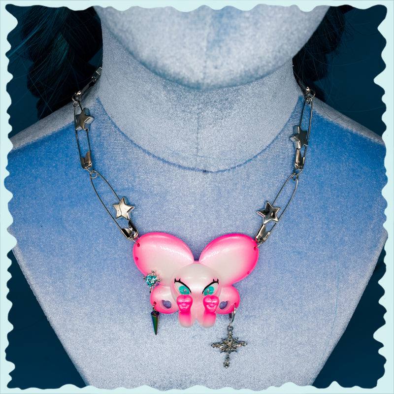 Twin-Trunk Diva Elephant Necklace with bubblegum pearl and metal chain
