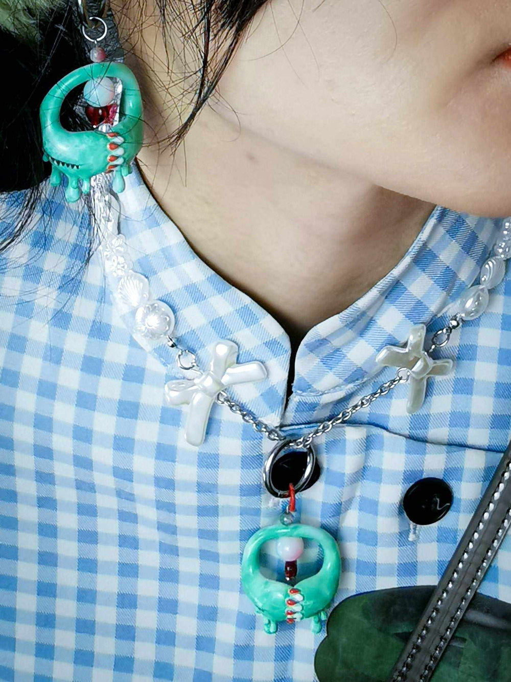 Jade green monster jewelry, Little lash teeth necklace and earrings, Unique creature-inspired set, Whimsical monster accessory, Jade green creature-themed adornments, Playful lash teeth jewelry set, Green monster-themed necklace, Eccentric jade pendant and earrings, Funky lash teeth fashion accessories, Adorable creature-inspired jewelry, Jade green monster chic set,